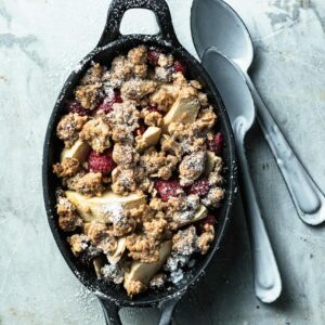 apple and red lentil crumble in an ovenproof dish.